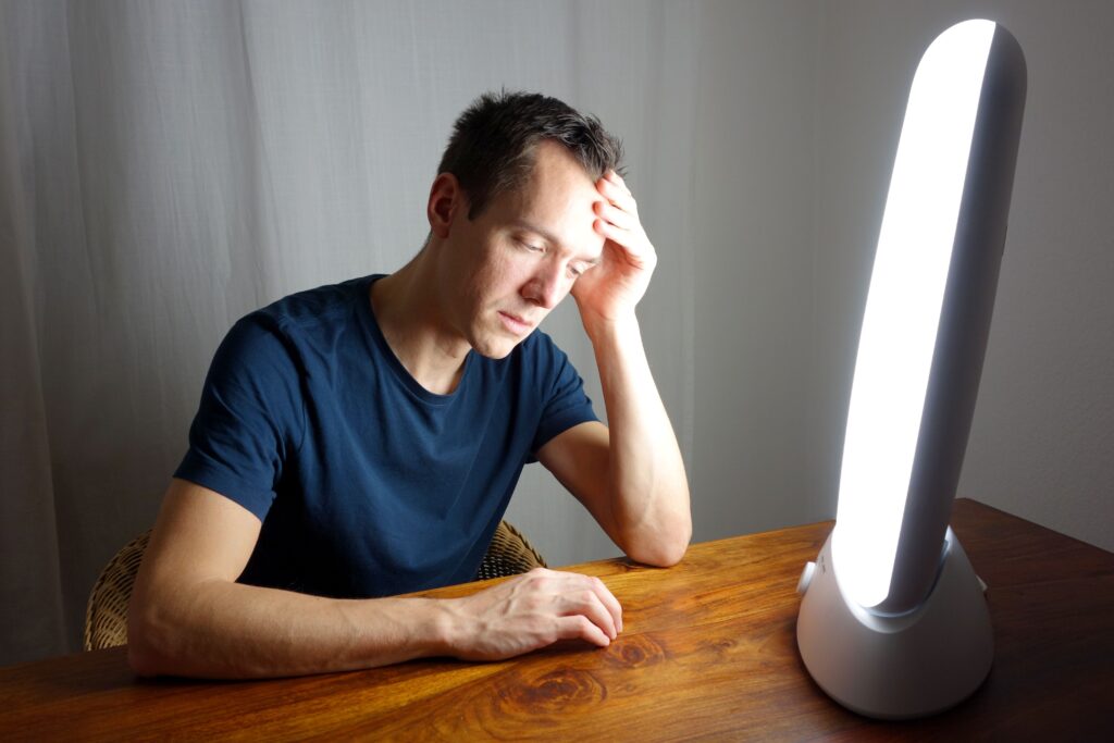 Man looking like our SAD information session might be of help to him learn ways to Overcome the Winter Blues (SAD)
