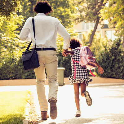 Dad and daughter running late for school