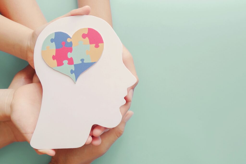 A jigsaw puzzle in the shape of a heart as a brain, symbolizing our Mindfulness Introduction Session and Course